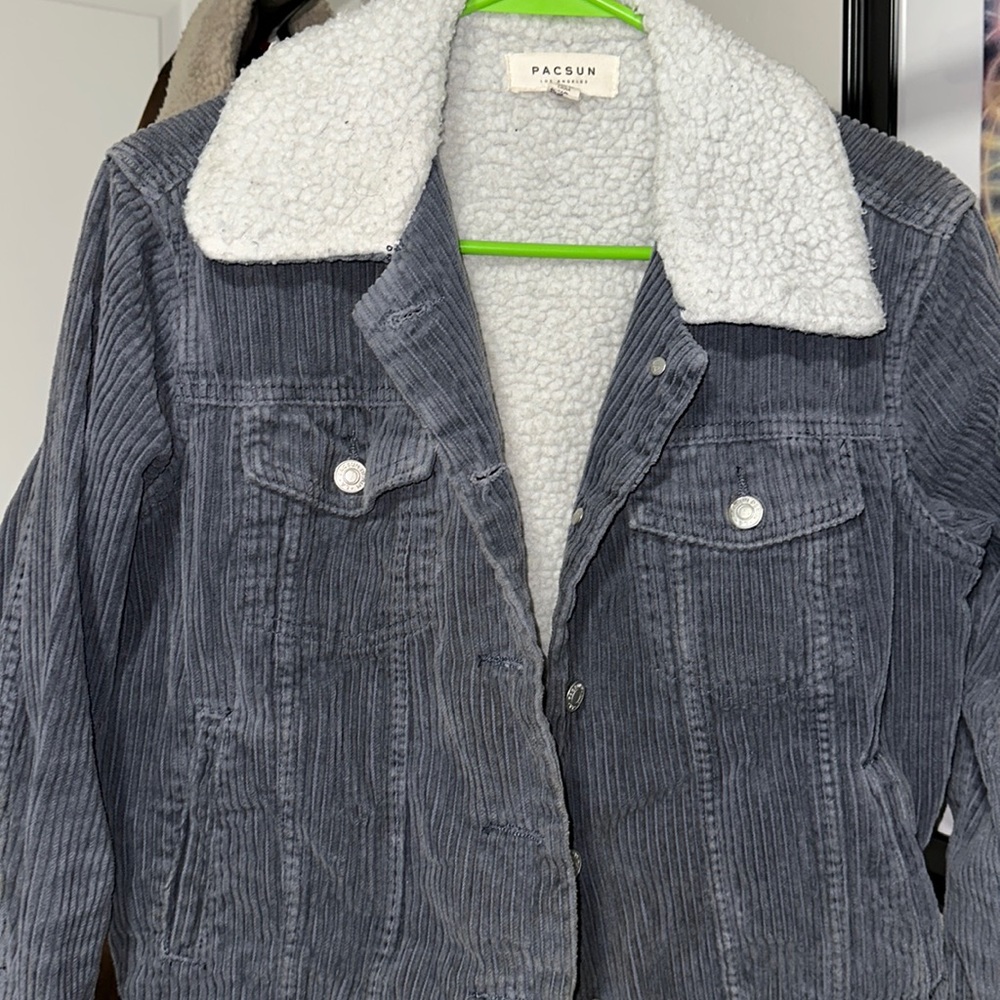 a pacsun corduroy, w fur. I do not wear it anymore.:( i wanted you to have it <3